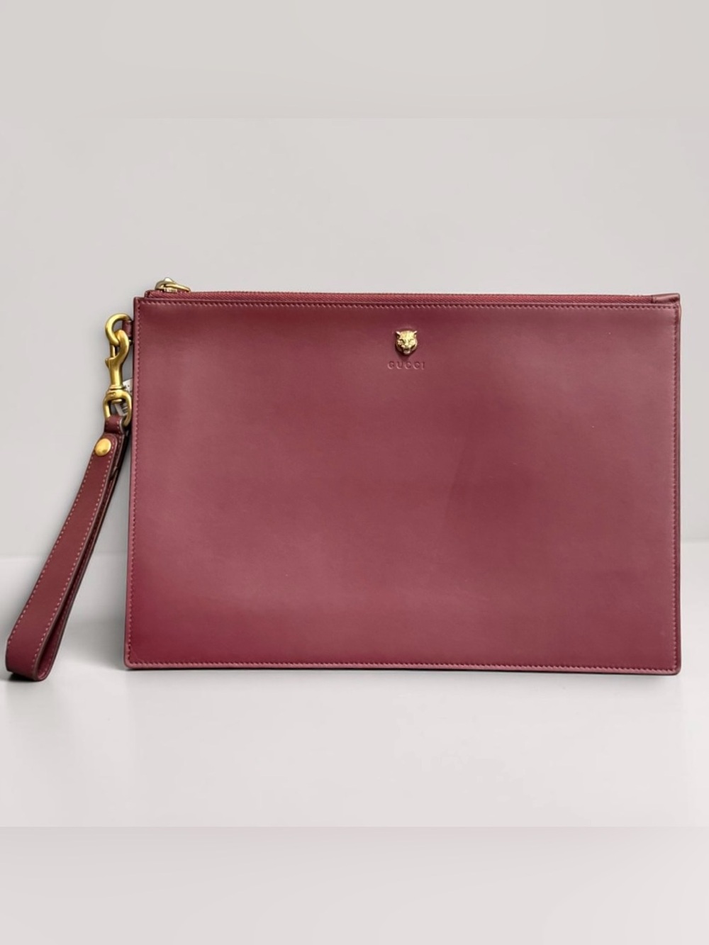 Gucci Animalier Burgundy Leather Wristlet Clutch with Gold-Tone Hardware